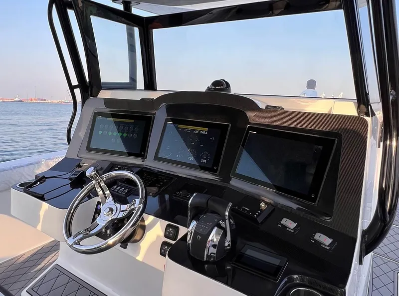 Helm console detailing around the steering wheel and displays